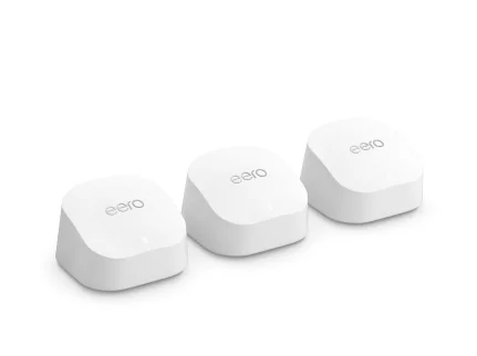 Three small white eero 6+ units with the eero wordmark on top