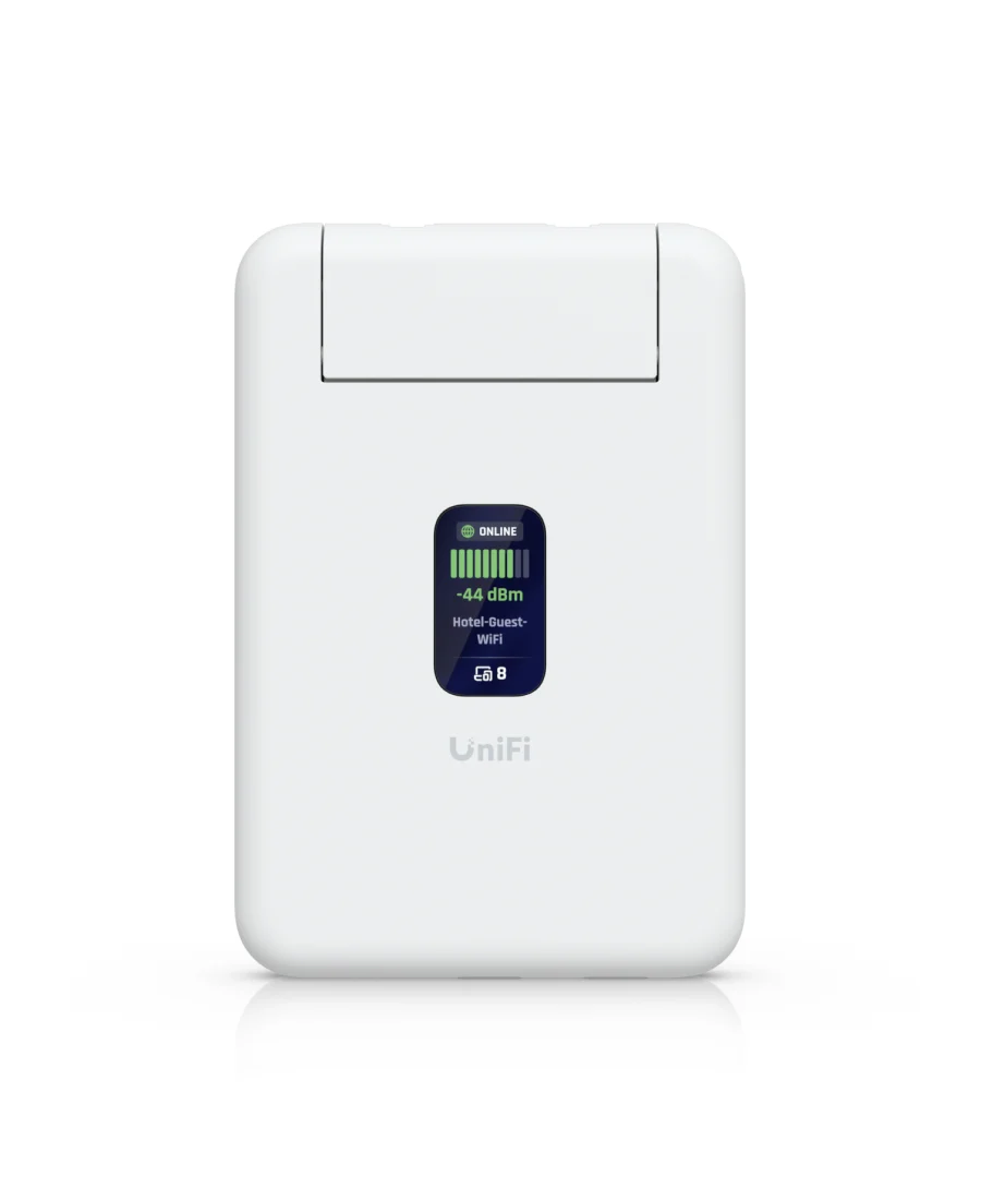 White UniFi Travel Router seen from the front, with a small color status screen showing signal strength and a UniFi logo